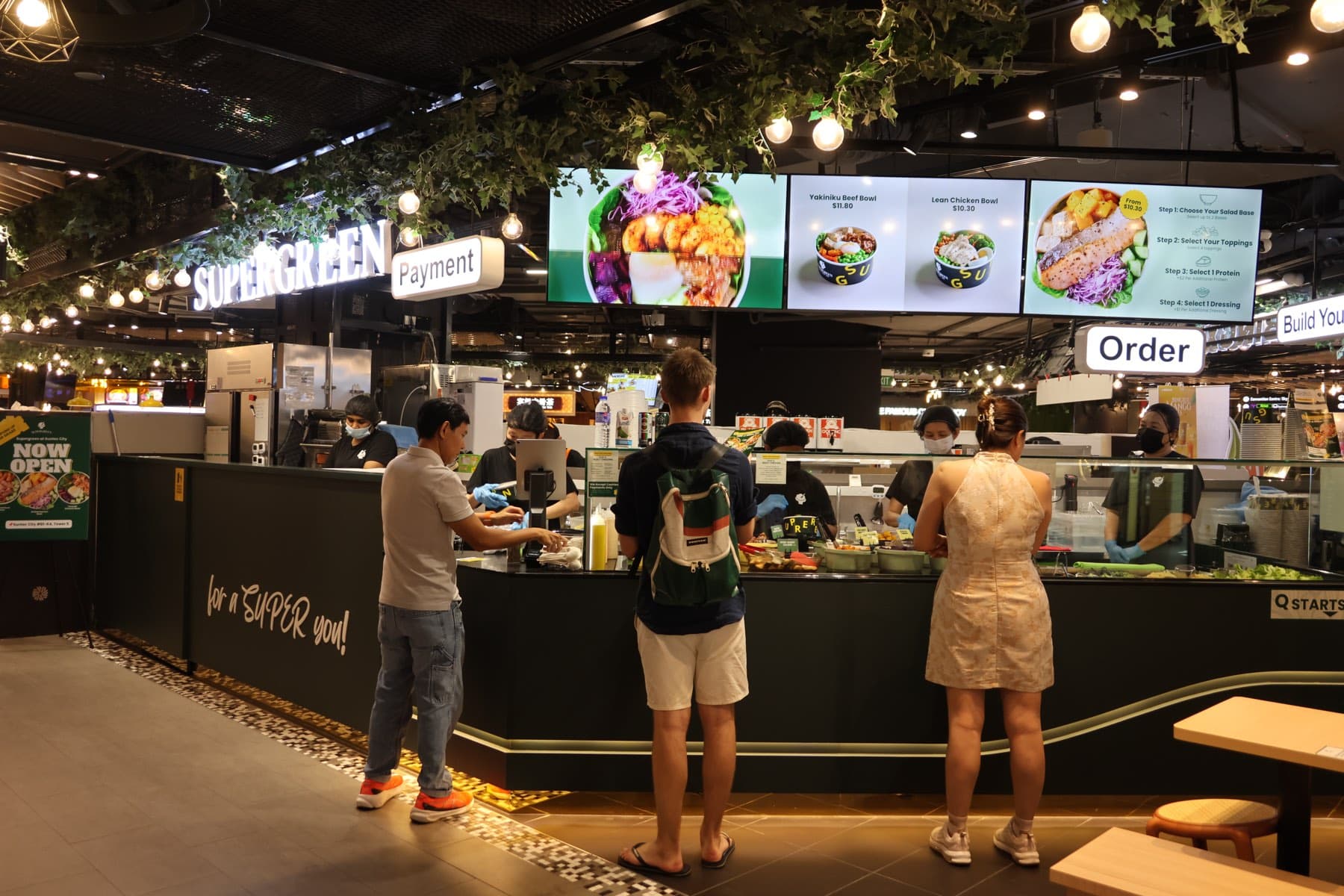 Guests ordering at the Supergreen Suntec City counter